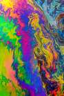 Abstract pattern in oil spilled in small stream-Costa Rica Art Print
